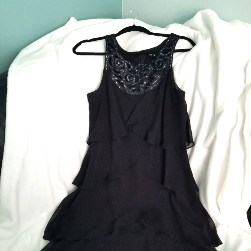 A black, embellished layered dressed.